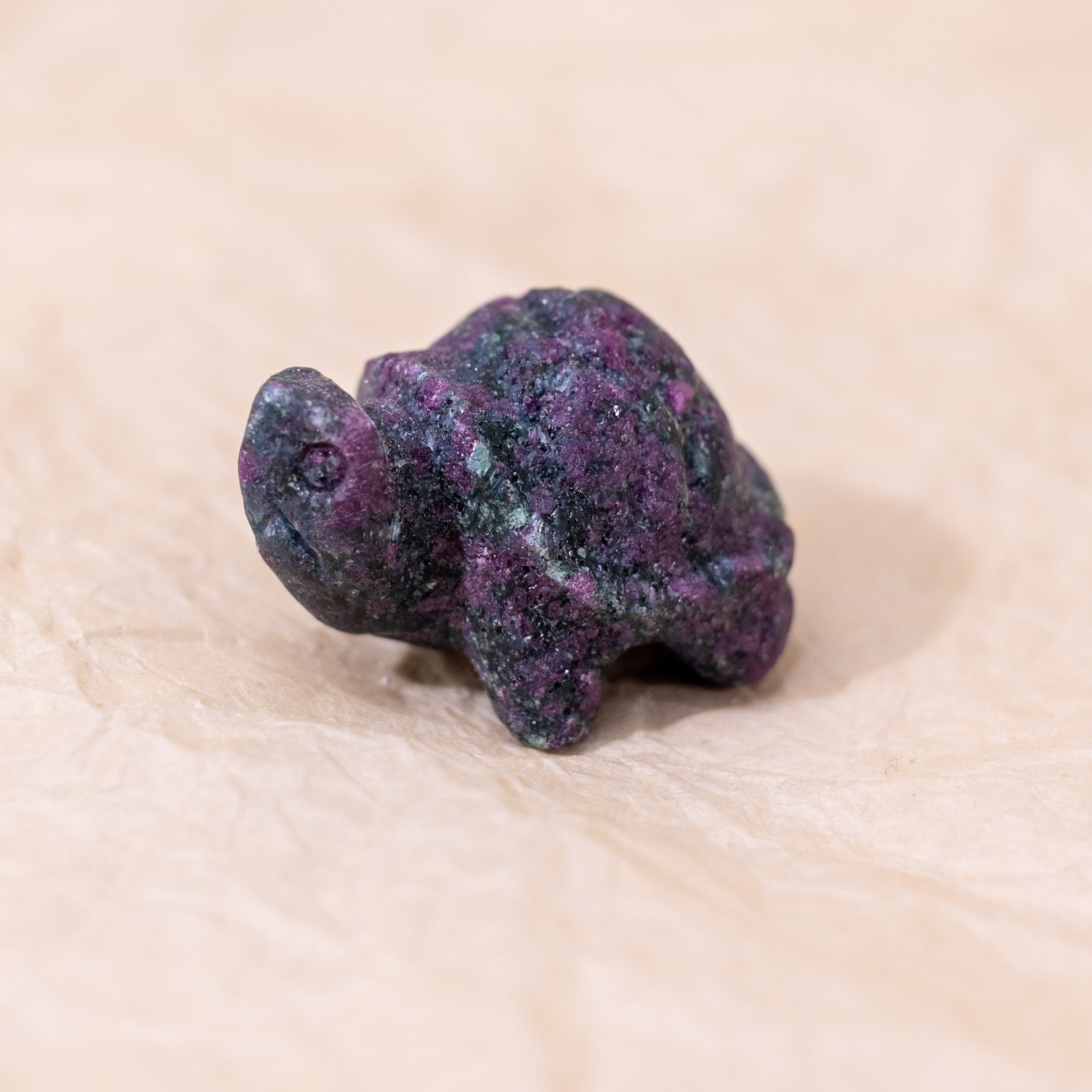 Ruby In Zoisite Mini Turtle, combines vibrant ruby and calming zoisite, symbolizing emotional balance and vitality.