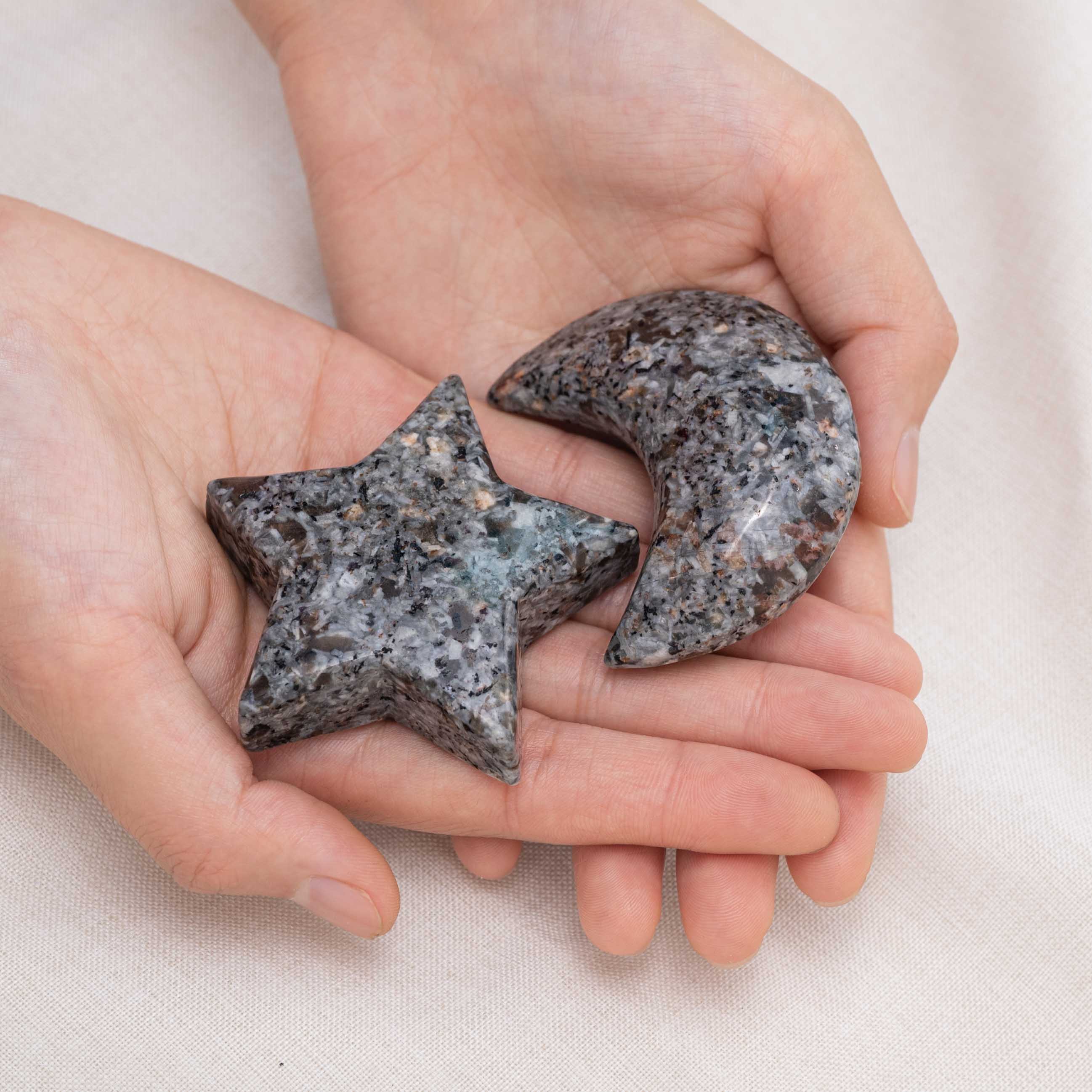 Yooperlite Star/Moon Palm Stone held in hand