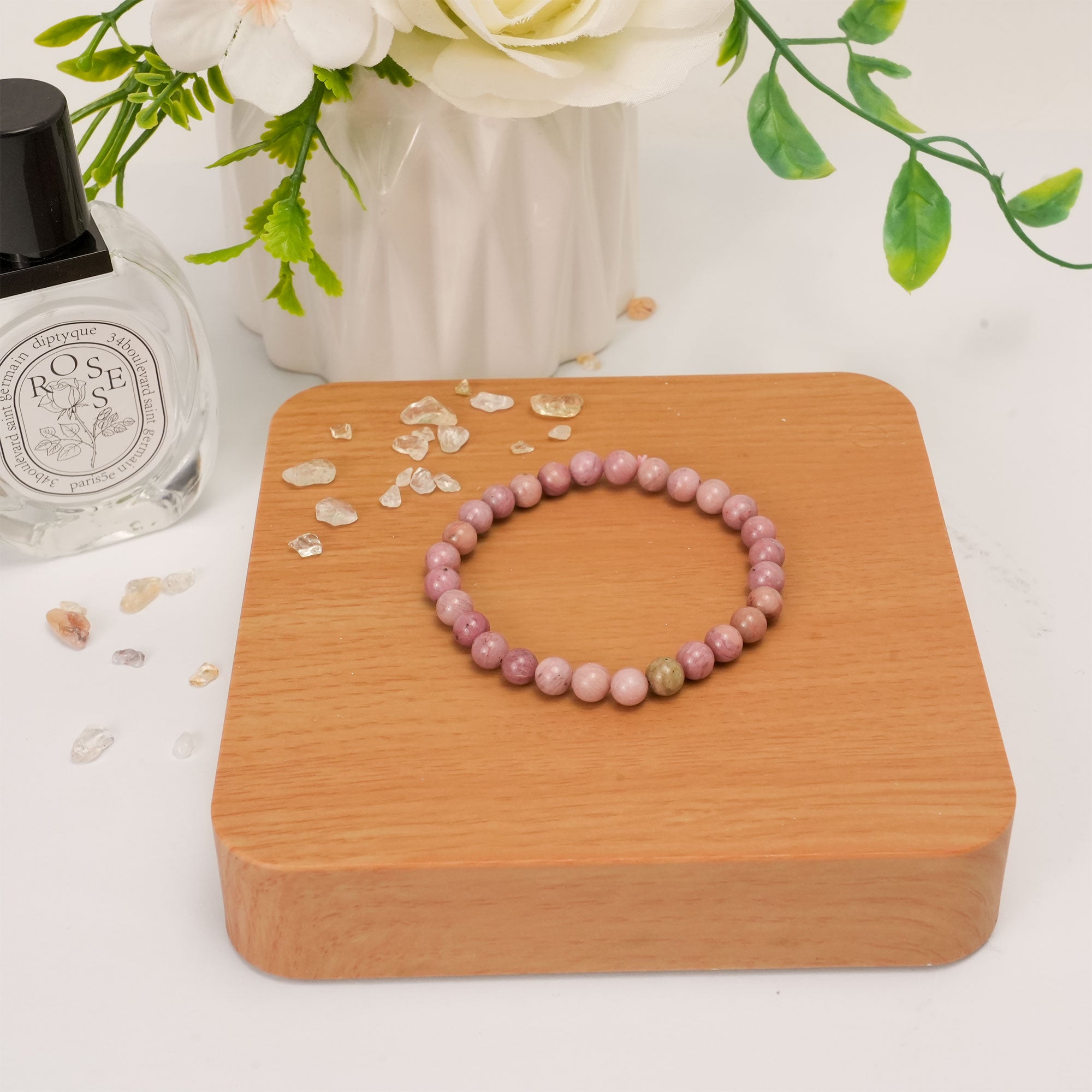 Healing Rhodonite crystal bracelet, designed to balance emotions and promote a sense of calm and tranquility