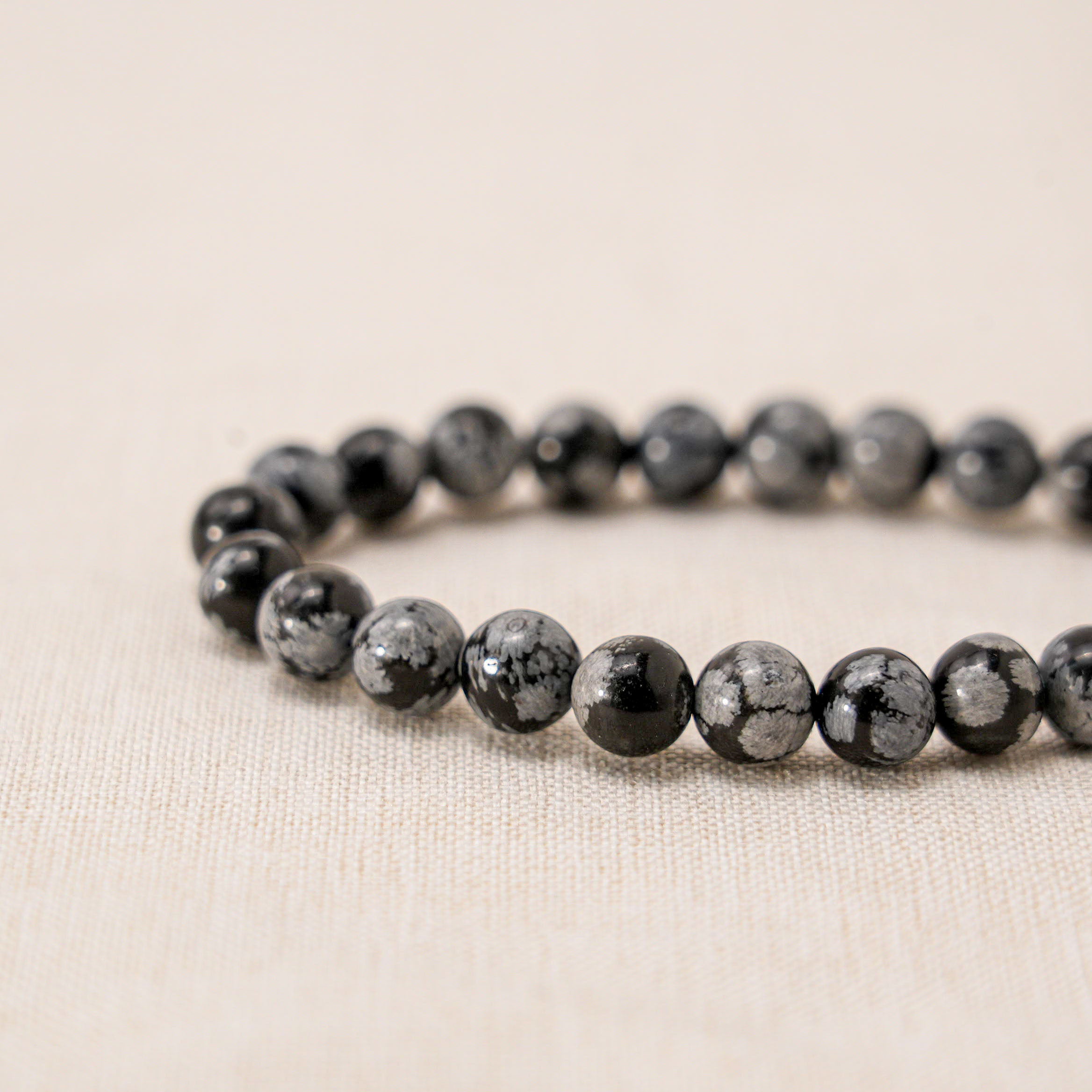 Snowflake Obsidian Bracelet designed to enhance spiritual protection and grounding