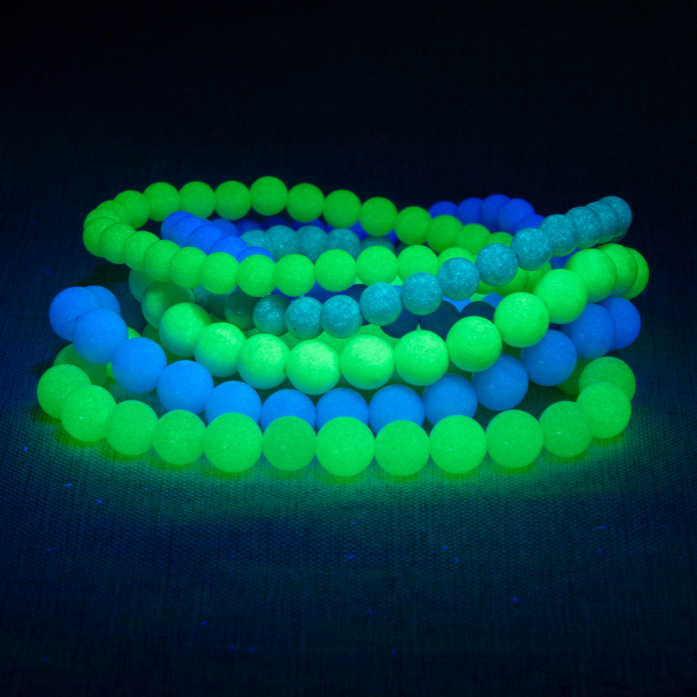 Glowing luminous stone bracelet that emits radiant light, promoting relaxation and tranquility.