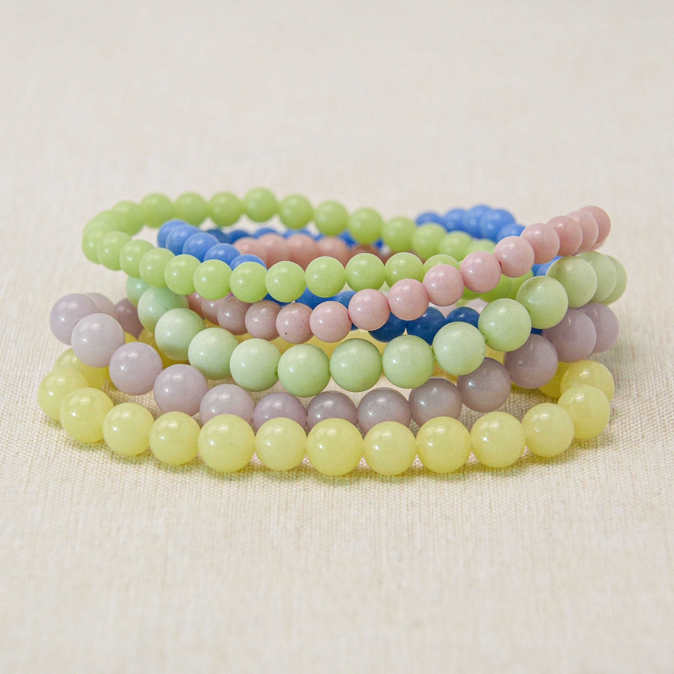 A luminous stone bracelet that emits a soft, glowing light, enhancing the wearer's energy and aura.