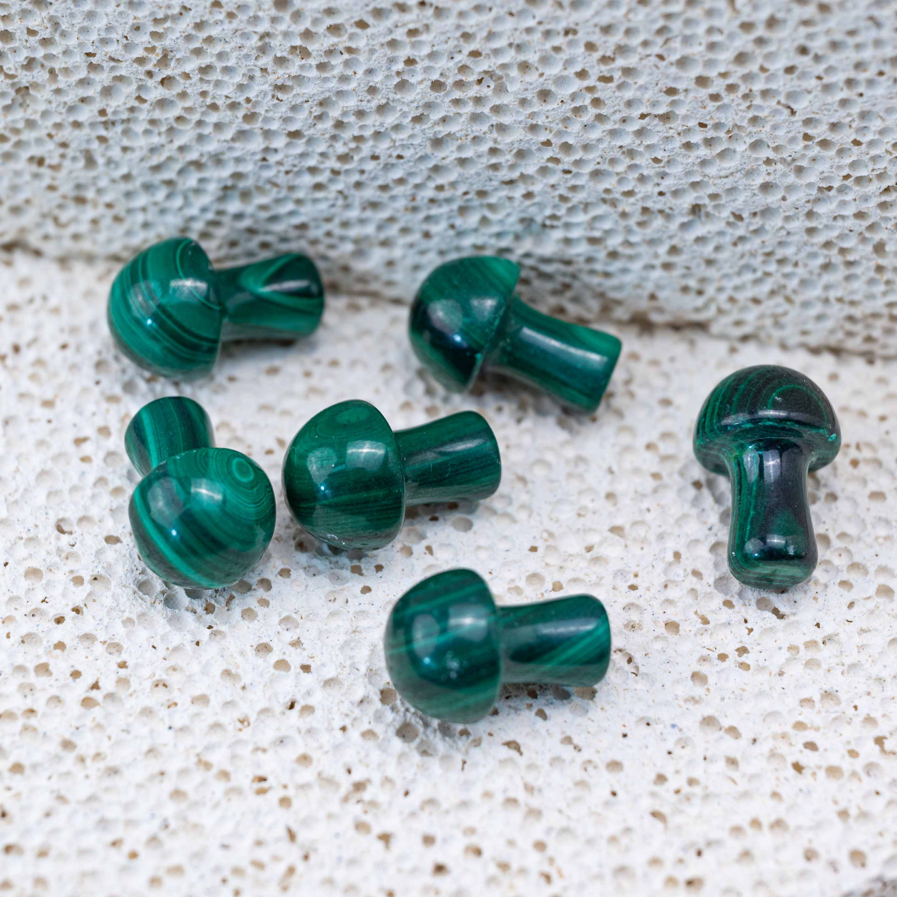 This Malachite Mushroom serves as a healing stone, absorbing negative energies and enhancing emotional stability.