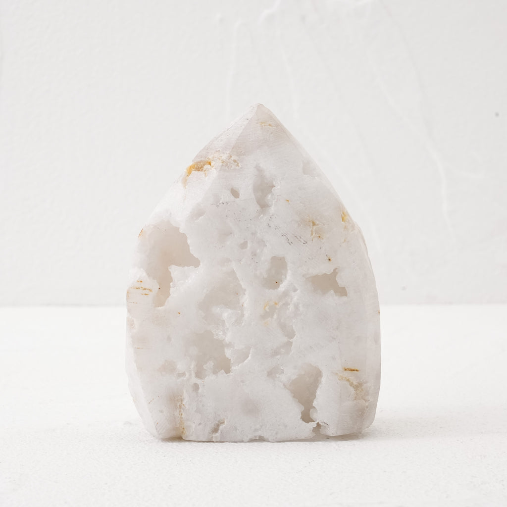 Close-up of Clear Quartz Geode Freeform Crystal showing detailed crystal clusters