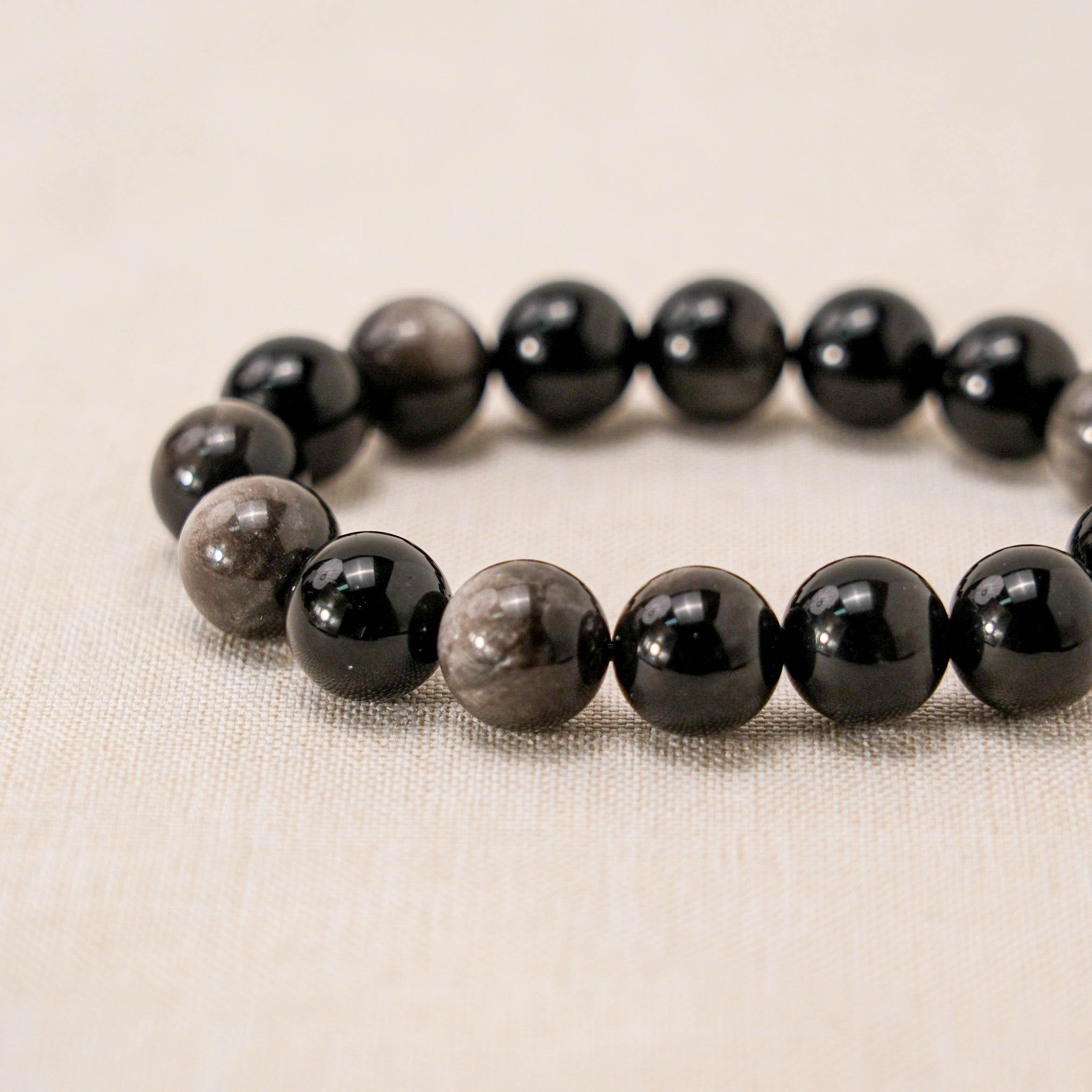  A natural Silver Obsidian Bracelet for grounding and focus.