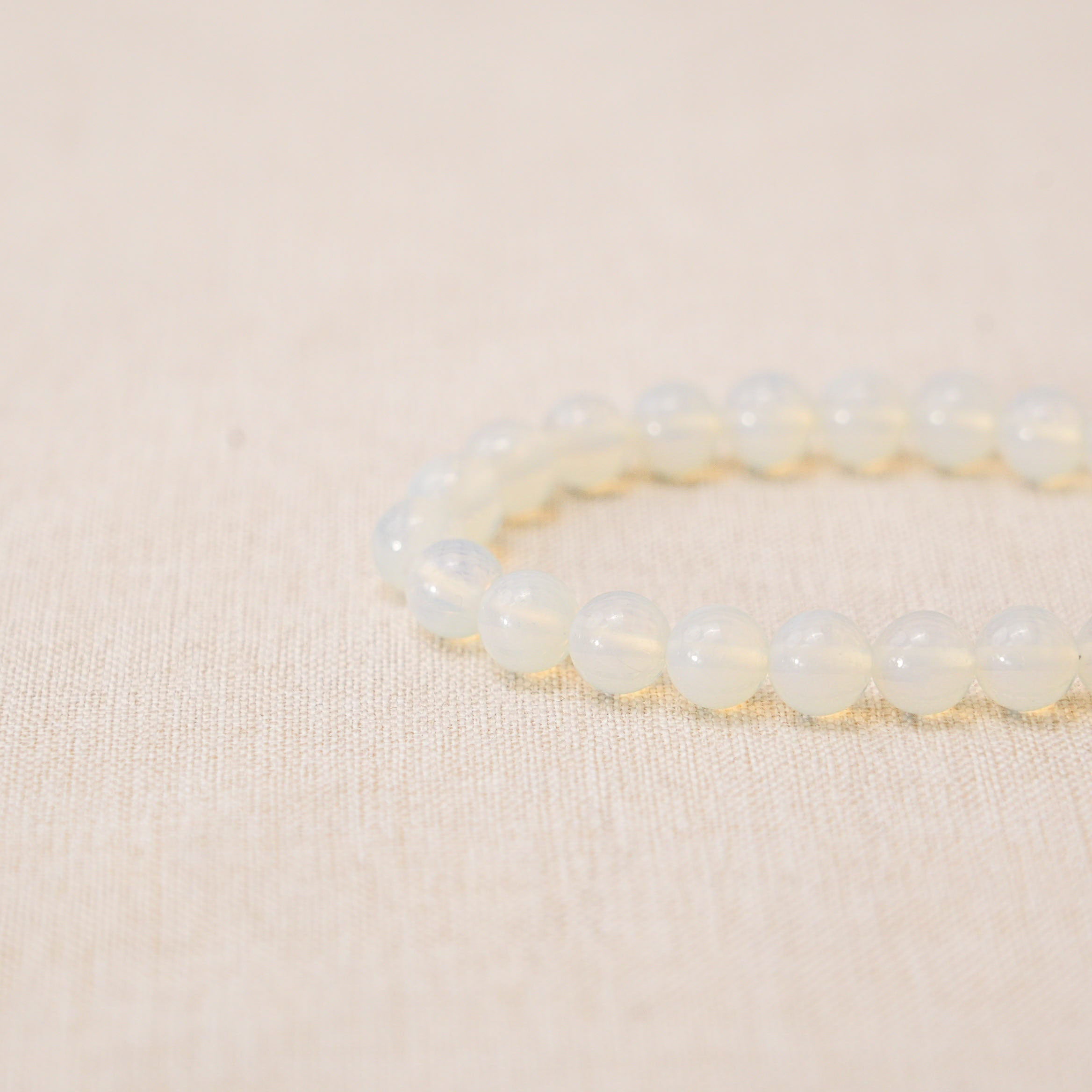 Iridescent opalite bracelet for enhancing mindfulness and spiritual growth