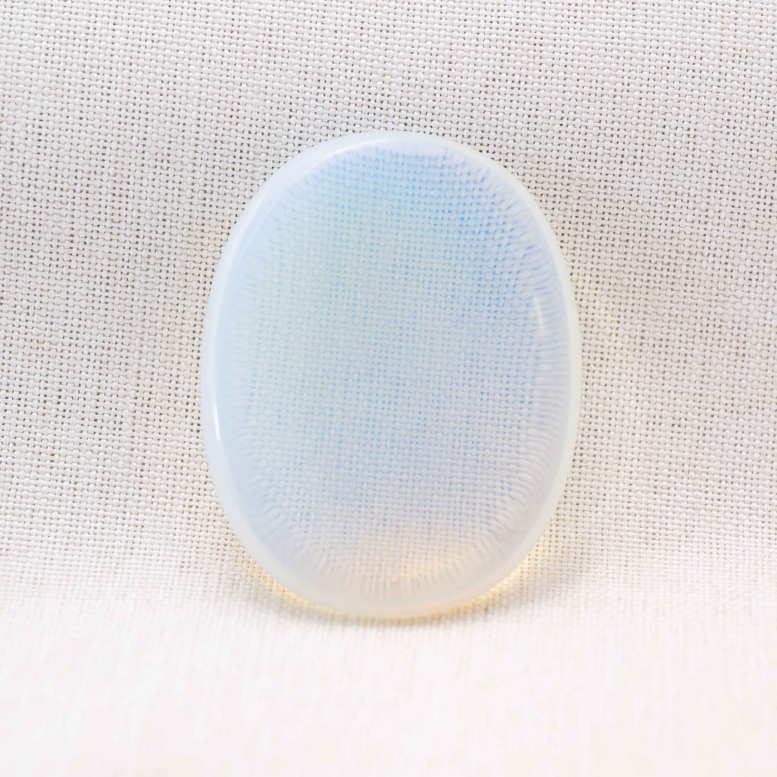 The Opalite Worry Stone enhances mental clarity and focus