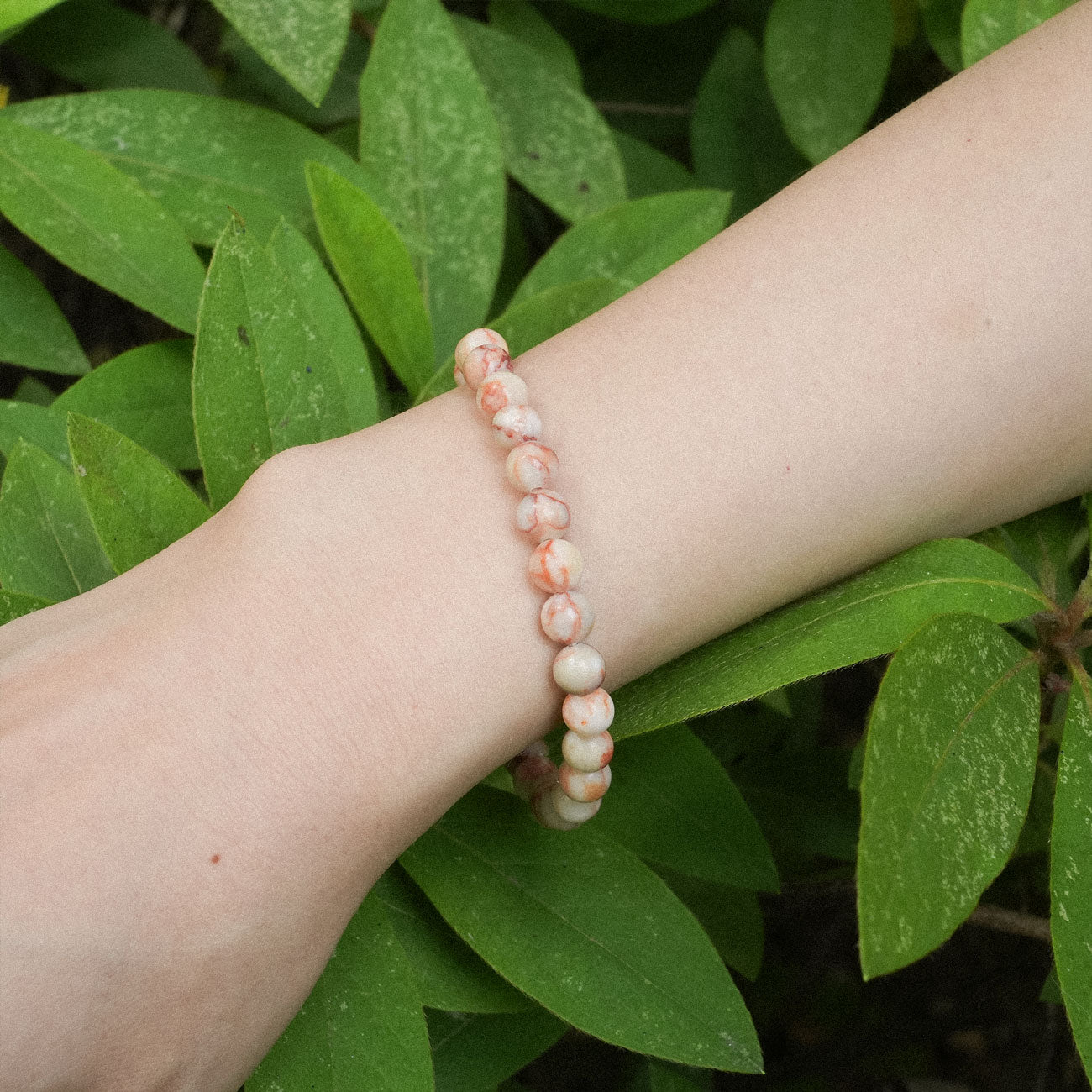 Stylish Red Net Stone Bracelet featuring natural stone patterns, perfect for meditation and grounding