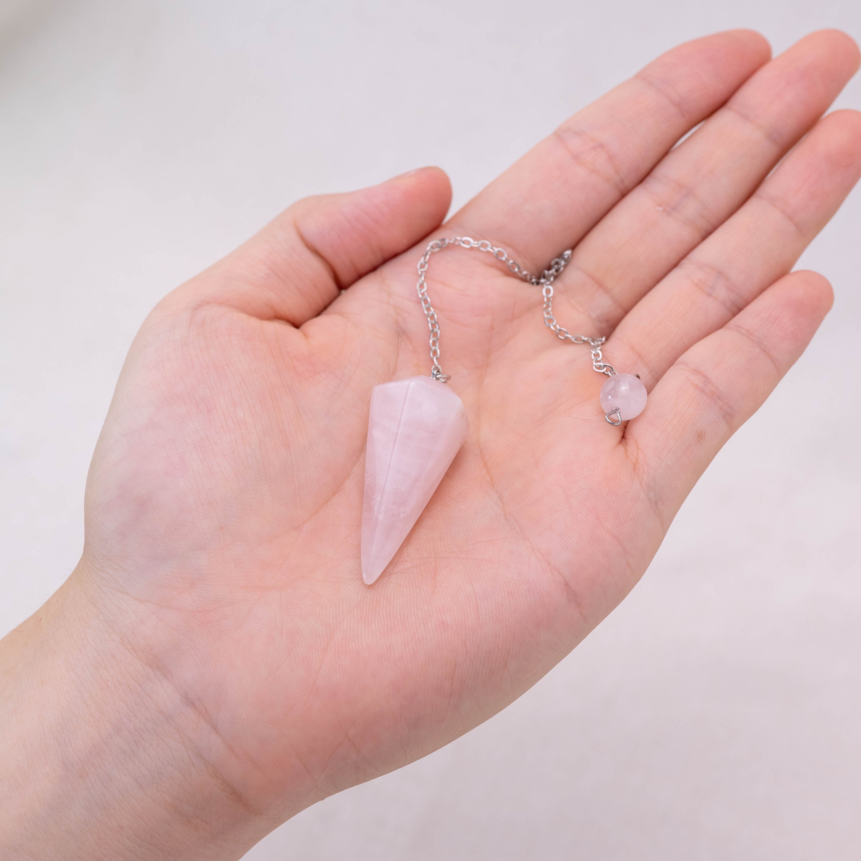 Rose Quartz Cone Pendulum for spiritual growth and peace