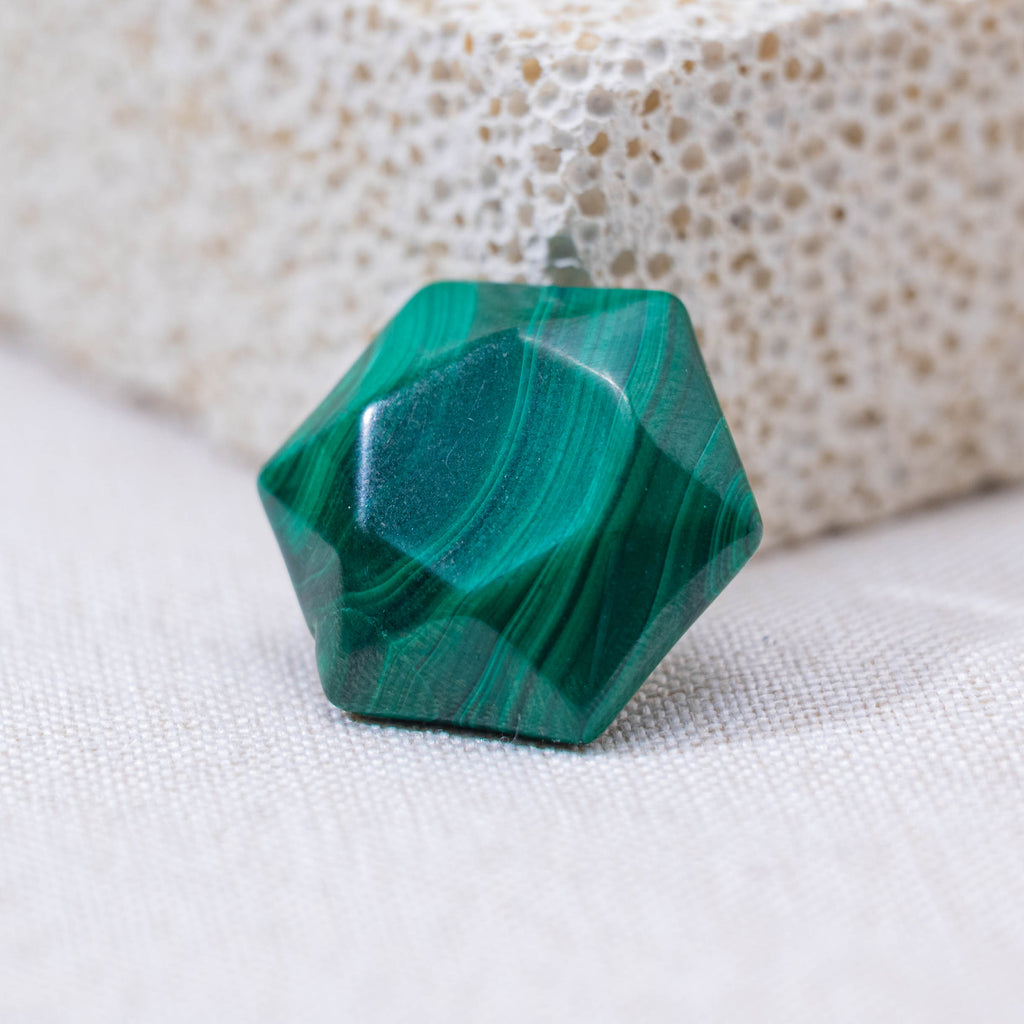 The polished Malachite Star of David absorbs negative energies and enhances positive vibrations.