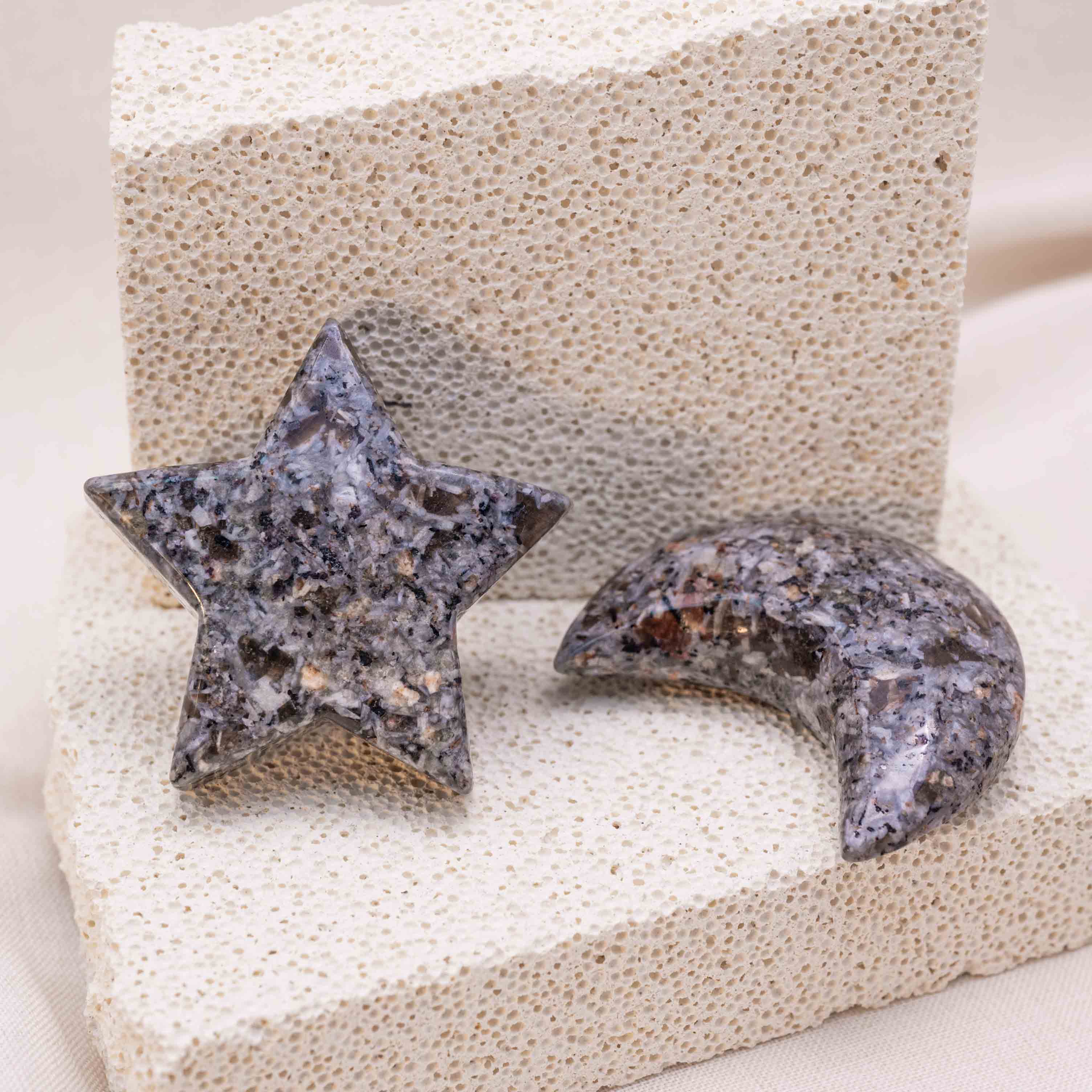 Display of Yooperlite Star/Moon Palm Stone